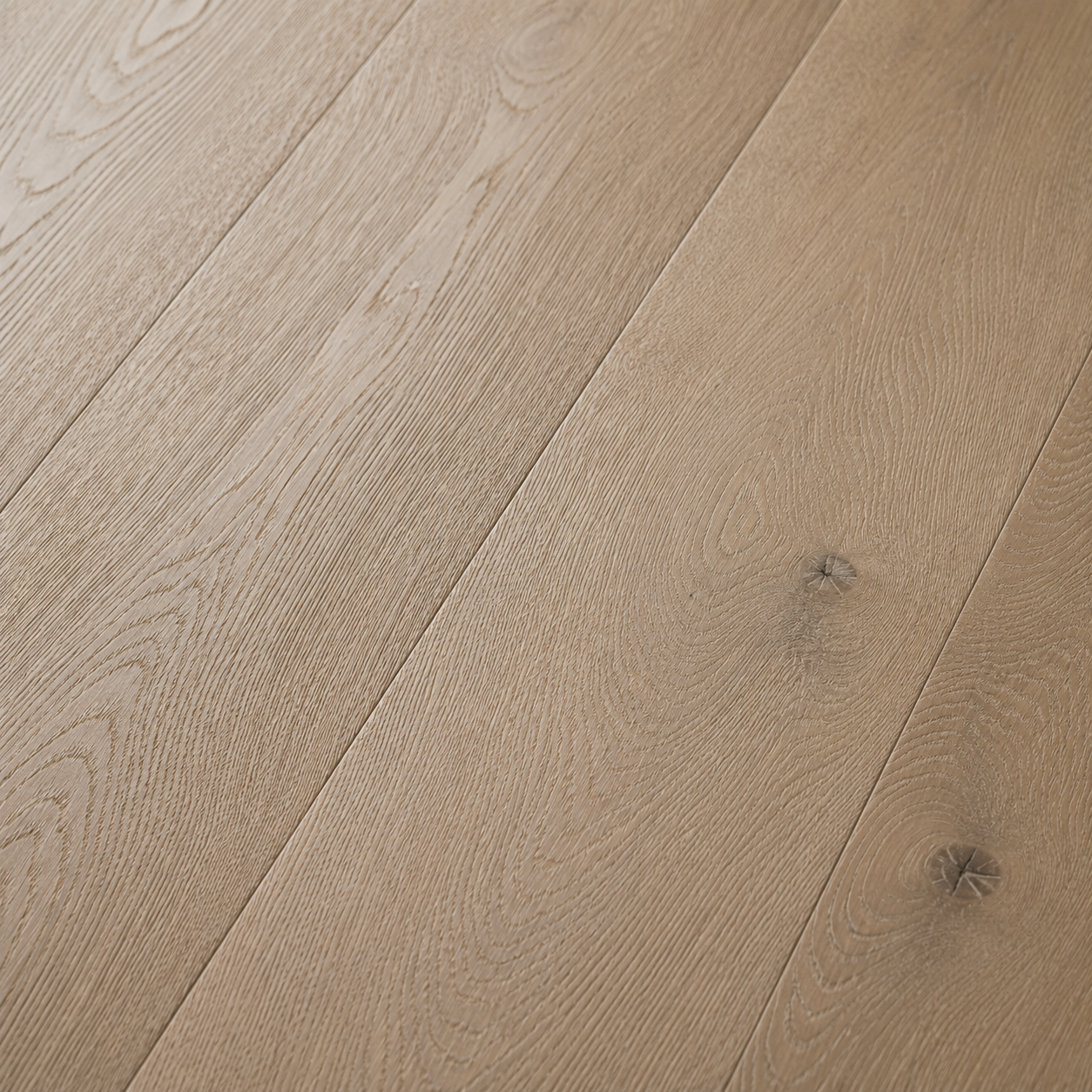 Close-up detail of wire-brushed white oak hardwood flooring texture