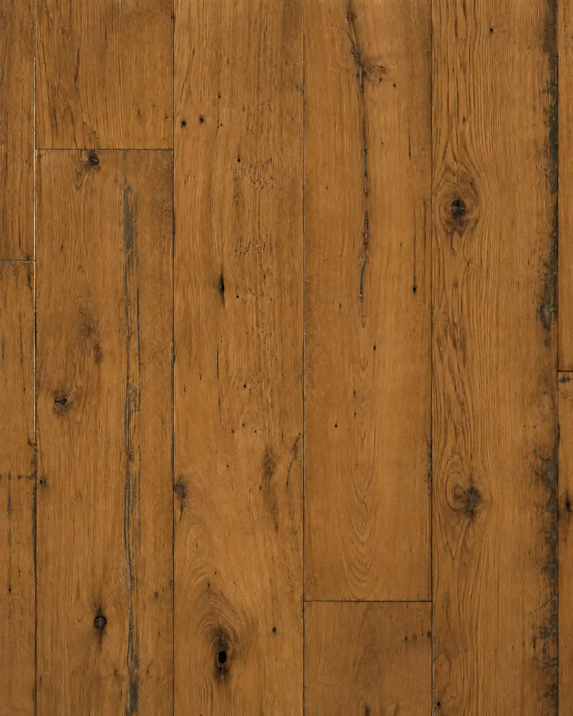Close-up detail of distressed hardwood flooring with aged marks and natural character