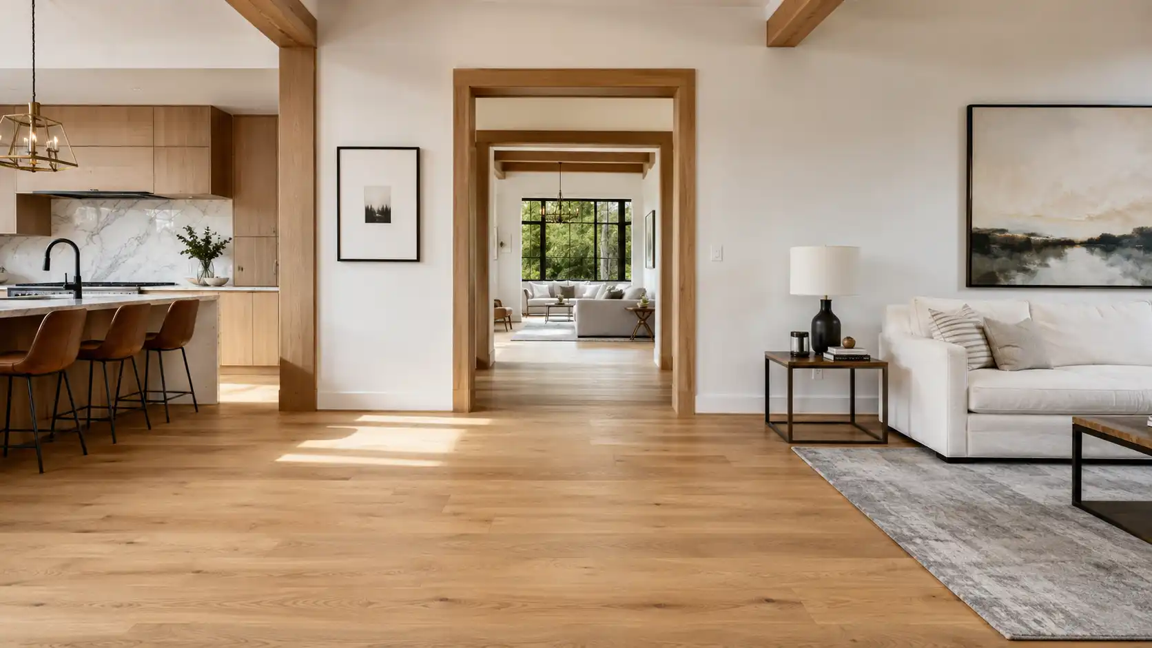 Cohesive interior design showing clear coat natural white oak hardwood flooring flowing seamlessly into matching white oak door casings